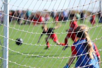 children playing soccer